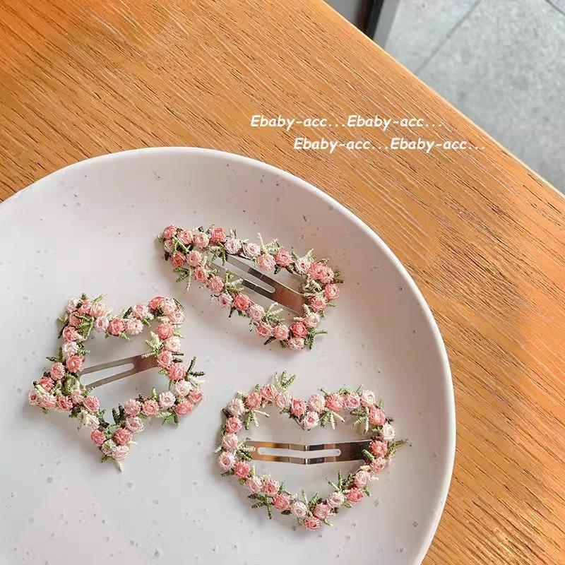 The Flower Hairpin Is Sweet and Ethereal. The Shark Hairpin Is Held At The Back of The Head