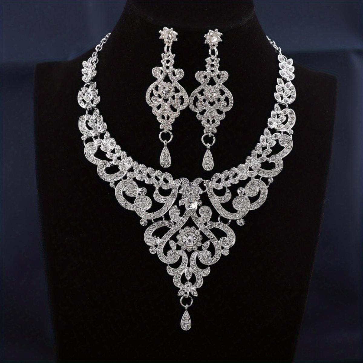 Elegant Three-Piece Rhinestone Floral Jewelry Set - Sparkling Rhinestone Embellished Flower Earrings, Necklace, and Bracelet ZT6587-1 Silver