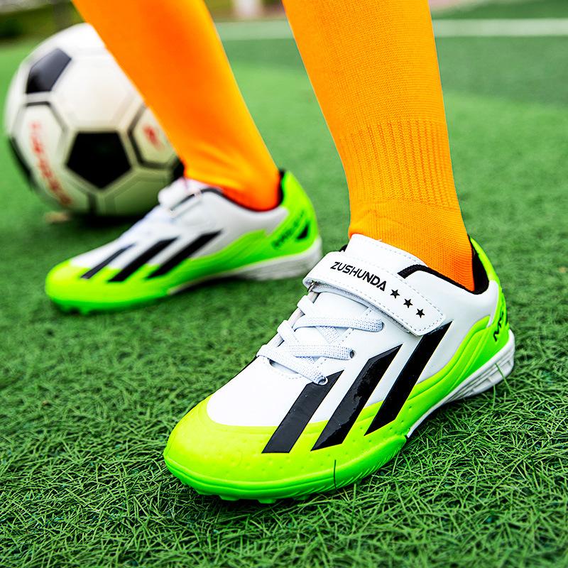 Children's football shoes tf broken nails artificial turf boys and girls leather foot training shoes