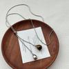 Elegant Silver Teardrop Titanium Steel Necklace for Women - Non-Fading, High-End Feel, Perfect for Long Sweater Chains.