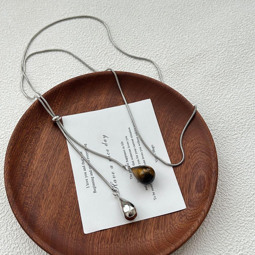 Elegant Silver Teardrop Titanium Steel Necklace for Women - Non-Fading, High-End Feel, Perfect for Long Sweater Chains.