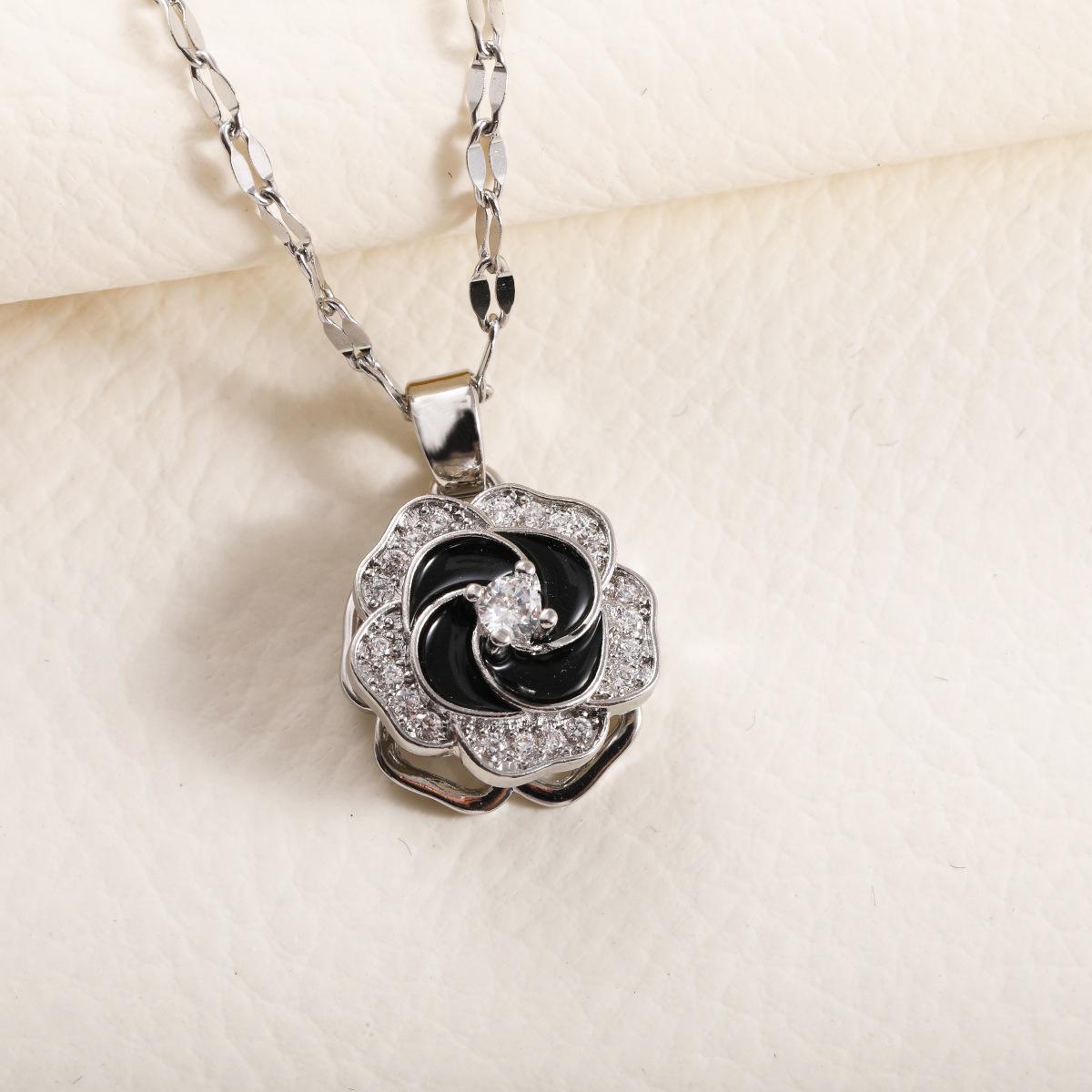 

Women s Rotatable Bauhinia Zircon Flower Pendant Necklace - Autumn/Winter Fashion Design