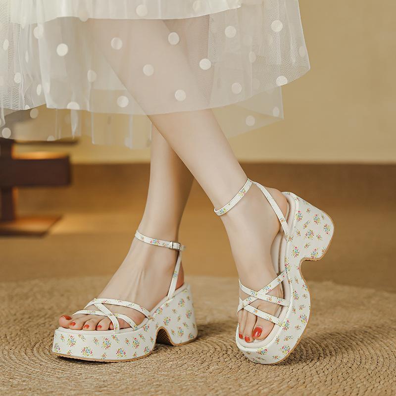 Sweet and cool wind thick-soled wedge sandals women's height increase 7cm muffin waterproof table one-word buckle belt summer new Roman shoes