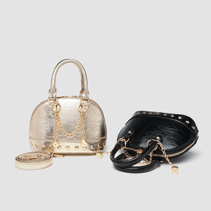 New European and American Niche Design High End Champagne Rivets Handheld Shell Bag Light Luxury One Shoulder Diagonal Straddle Bag
