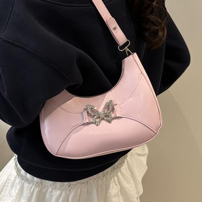 Vento de Spice Girl corrente ombro crossbody cor sólida borboleta estilo estrangeiro 2025 nova tendência casual bolsa de axila feminina