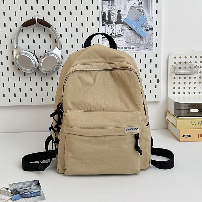

Backpack men s and women s simple large-capacity travel backpack couple leisure junior high school student high school college student schoolbag хаки