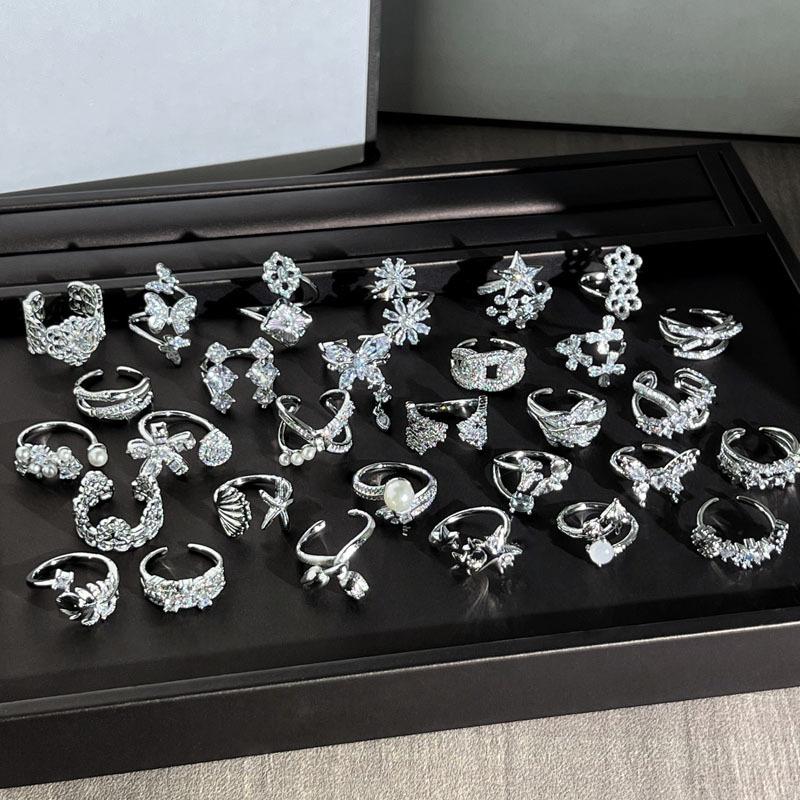 Light luxury Internet celebrity mix and match personalized flower bow fashion ring women full of diamonds flower language niche cold wind ring tide