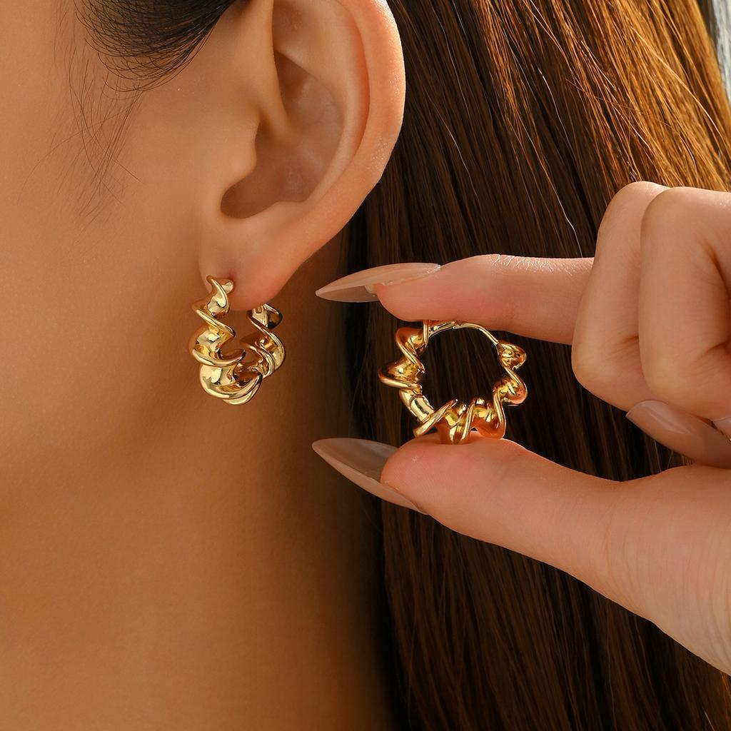 Popular geometric women's jewelry niche twisted design earrings high-end light luxury earrings versatile women