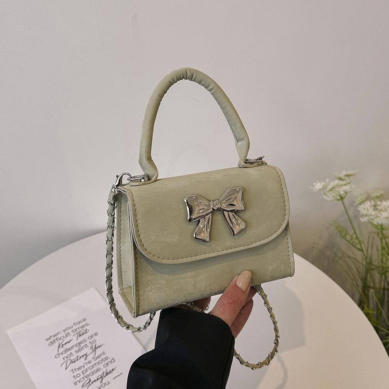 

New bag women s 2024 popular high-end summer chain shoulder messenger bag bow mini square bag зелений