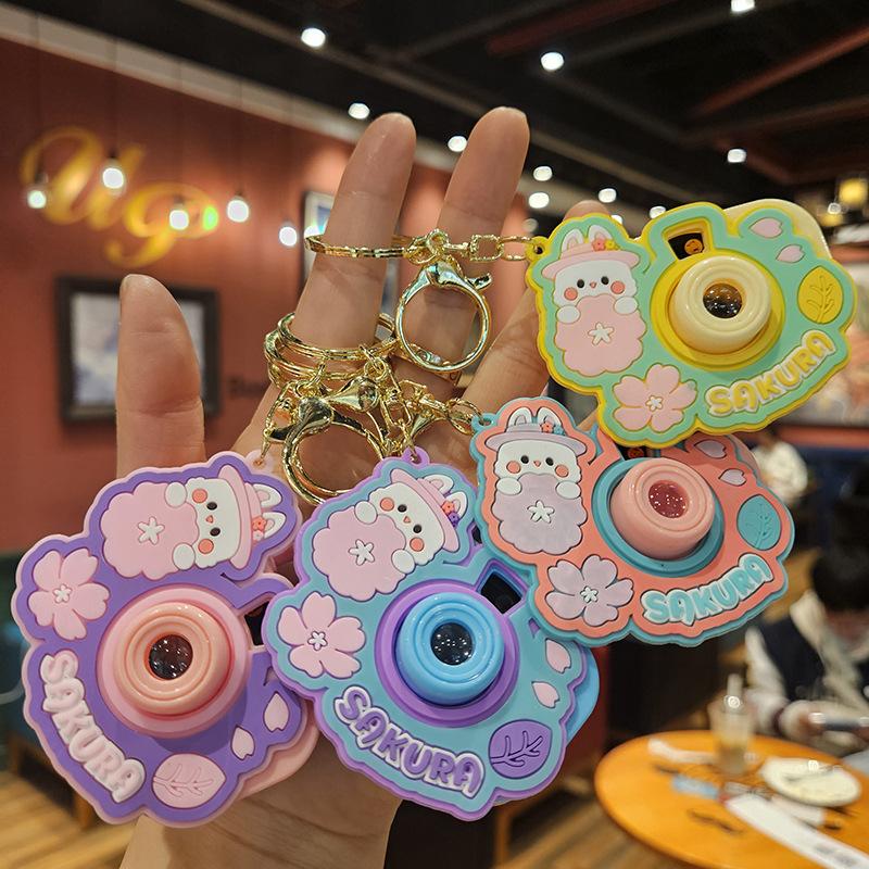 Niedliche Mini-Projektionskamera Cartoon Leuchtendes Projektionslicht Damenhandtasche Schlüsselanhänger Anhänger