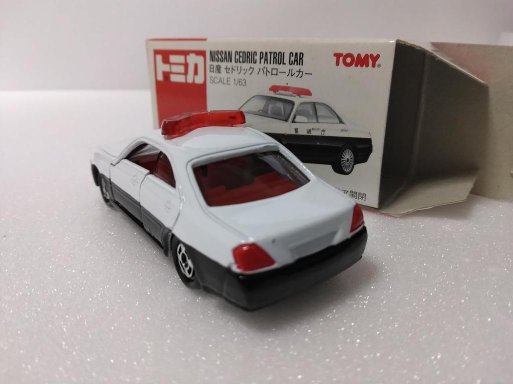 Tomica Nr. 58 Nissan Cedric Patruljebil, 163 skala
