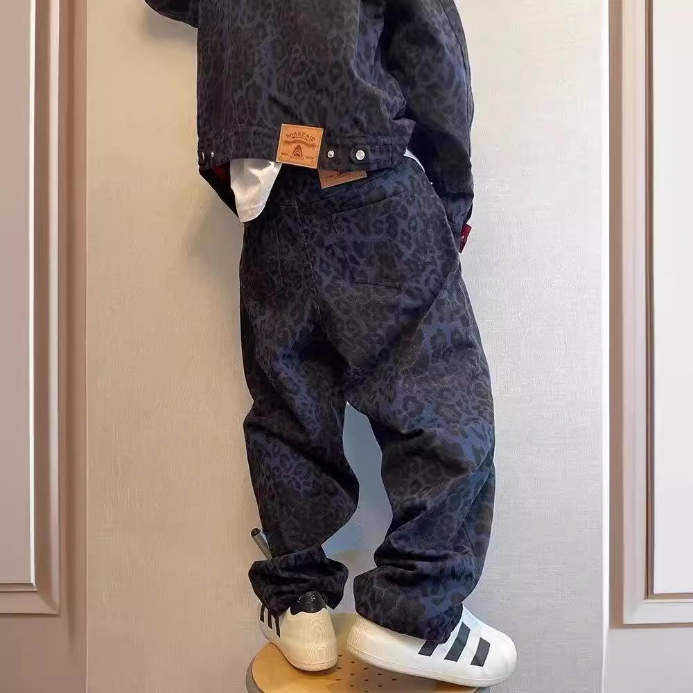 Americká vysoká pouliční móda: Pánské volné džíny s koženou výšivkou - Zimní trend, široký střih.