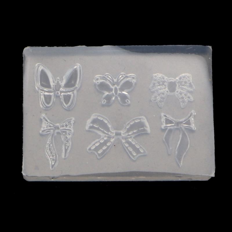 Sculpture Stamping Plate Nails Art Stencils Crystal Epoxy Resin Mold Silicone Nail Carving Mold 3D Mini Bowknot Mould