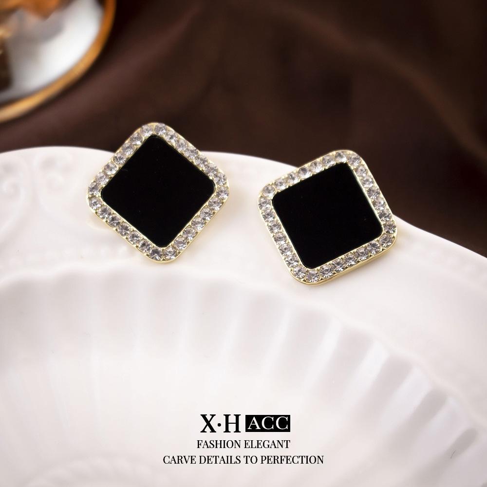 Elegant Gold-Plated Black Zircon Stud Earrings - Niche Design for a Luxurious Fashion Statement