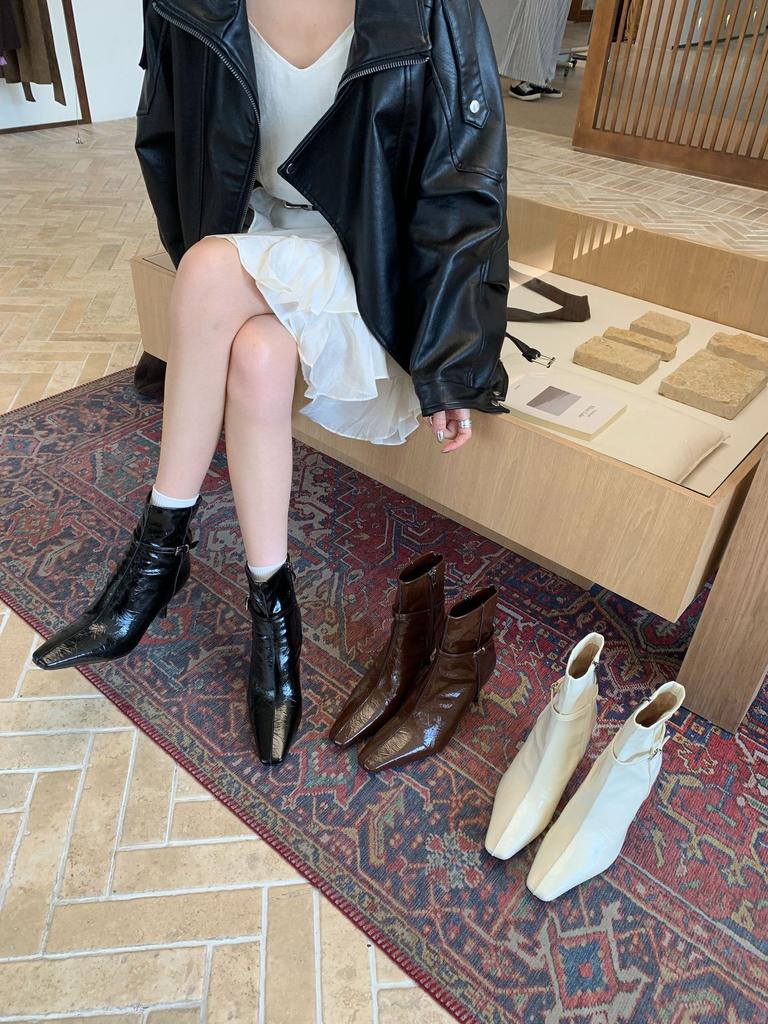 2025 autumn and winter new buckle thin high heel thin boots niche French temperament square head short boots commuter solid color boots