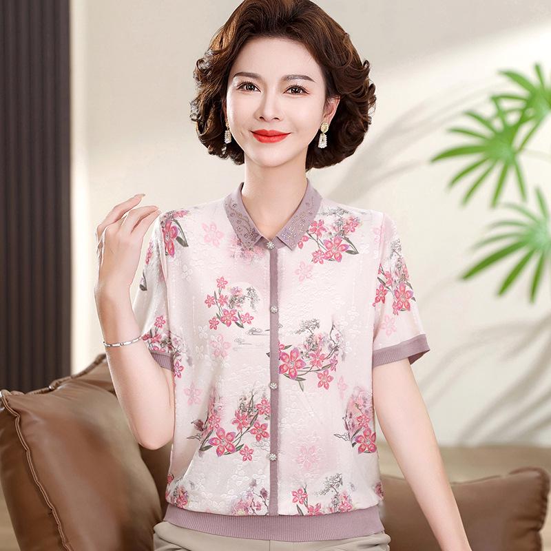 

Elegant Ice Silk Blouse: New 2026 Summer Style for Moms - Lapel, Loose, Short-Sleeved, Perfect for Middle-Aged and Elderly Women 4XL (recommended 67.5-75 kg) розовый