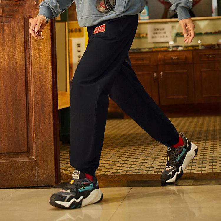 Li Ning Sports Lifestyle Series Trendy Solid Color Tapered Knit Joggers Unisex Joggers Black AKXS005-1