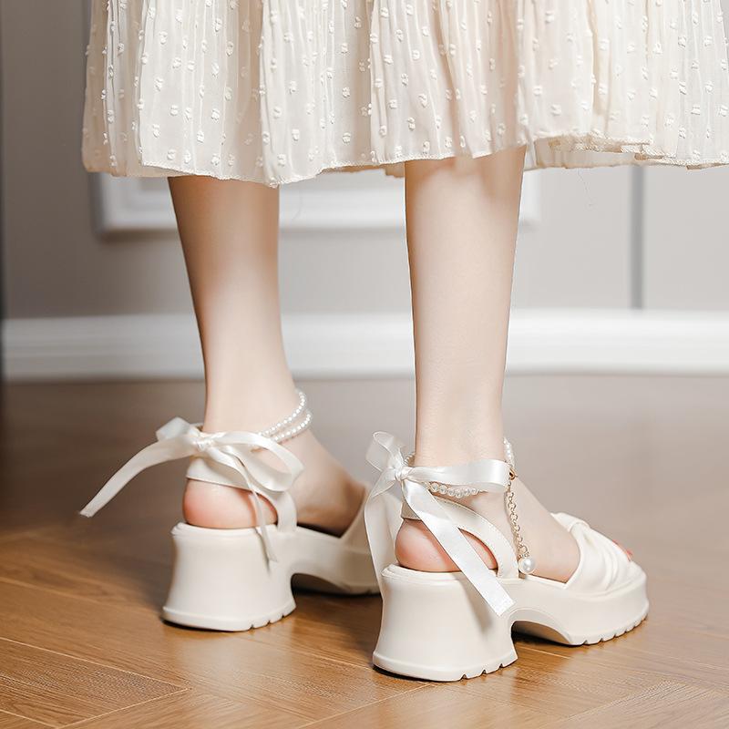 Summer is not tired of gentle feet fairy wind pearl bow thick heel platform sandals women's sense of stepping on shit increases Roman shoes