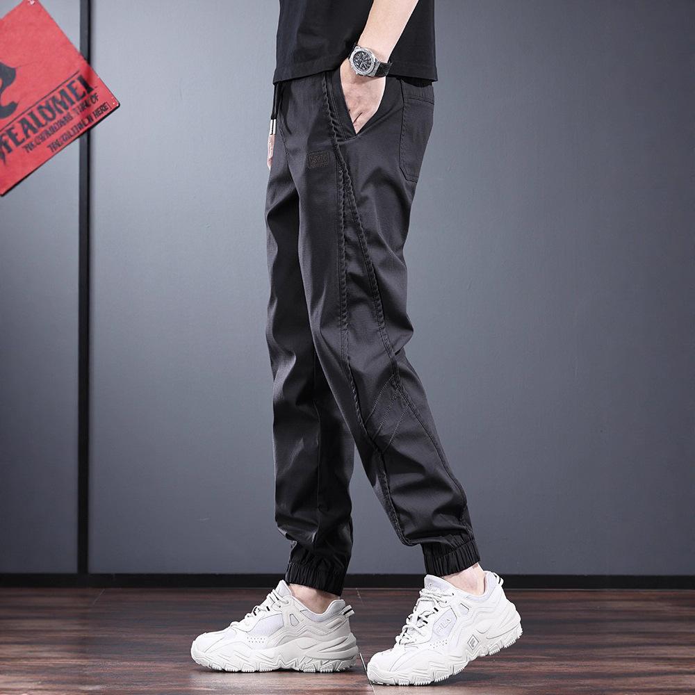 Black tooling casual pants men's new spring and autumn simple versatile leggings fashionable elastic waist men's pants