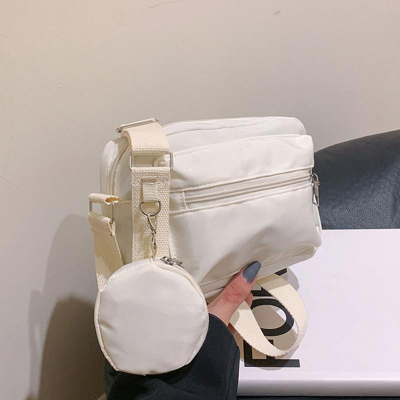 

Korean version of fashion messenger bag women s casual solid color small square bag women s trend versatile simple fashion shoulder armpit bag One Size білий
