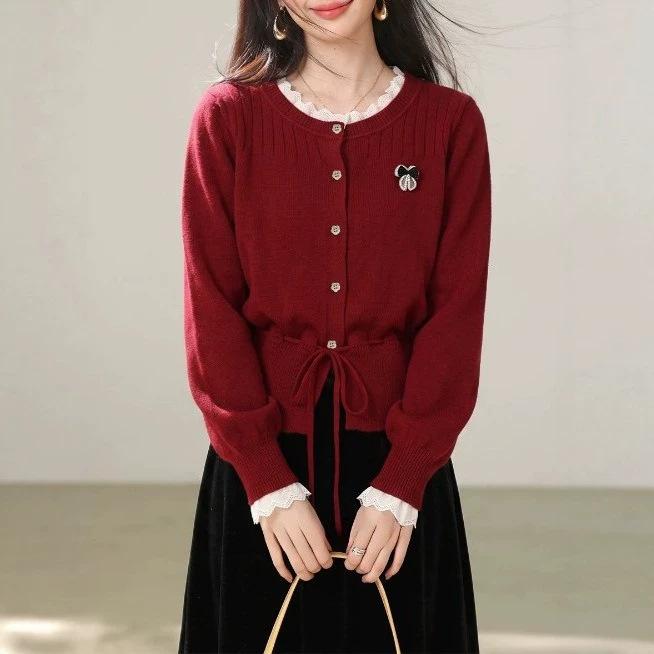 Gentle wind simple long-sleeved sweater women's autumn and winter explosion design sense waist drawstring thin knitted sweater versatile