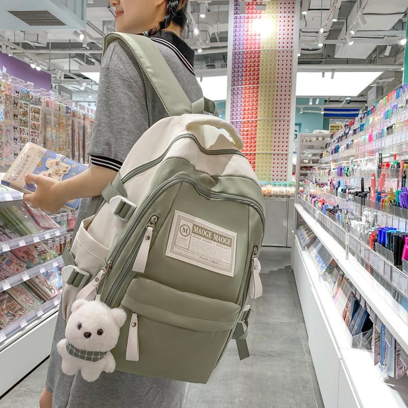 The schoolbag is high-value, fresh and cute, the schoolbag is casual, simple and light, and the commute is versatile and large capacity.
