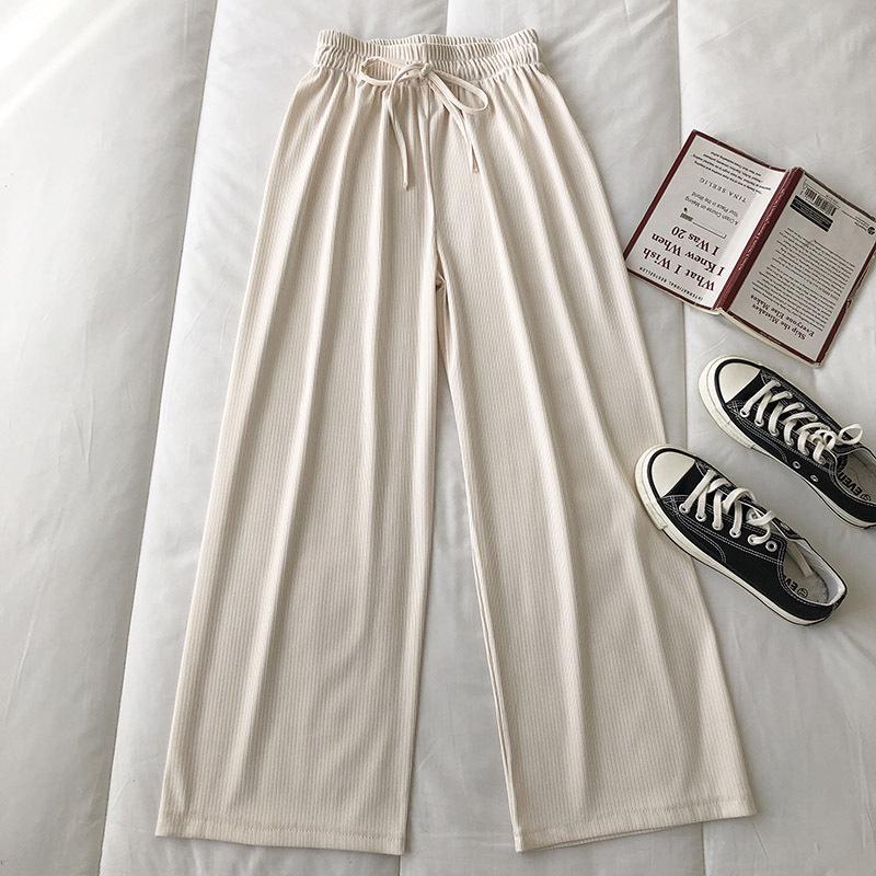 

Женские осенние брюки с эластичной талией и широкими штанинами—Корейский стиль, Свободные, Стройнящие, Драпирующиеся длинные брюки, Однотонные, Повседневный крой. One Size абрикосовый