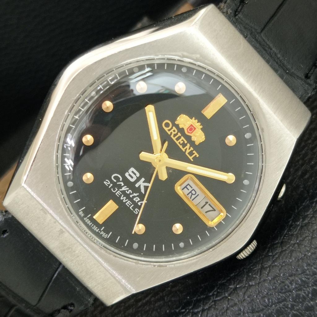 

AUTOMATIC VINTAGE ORIENT SK CRYSTAL 46941 JAPAN MENS BLACK DIAL WATCH a704845-1
