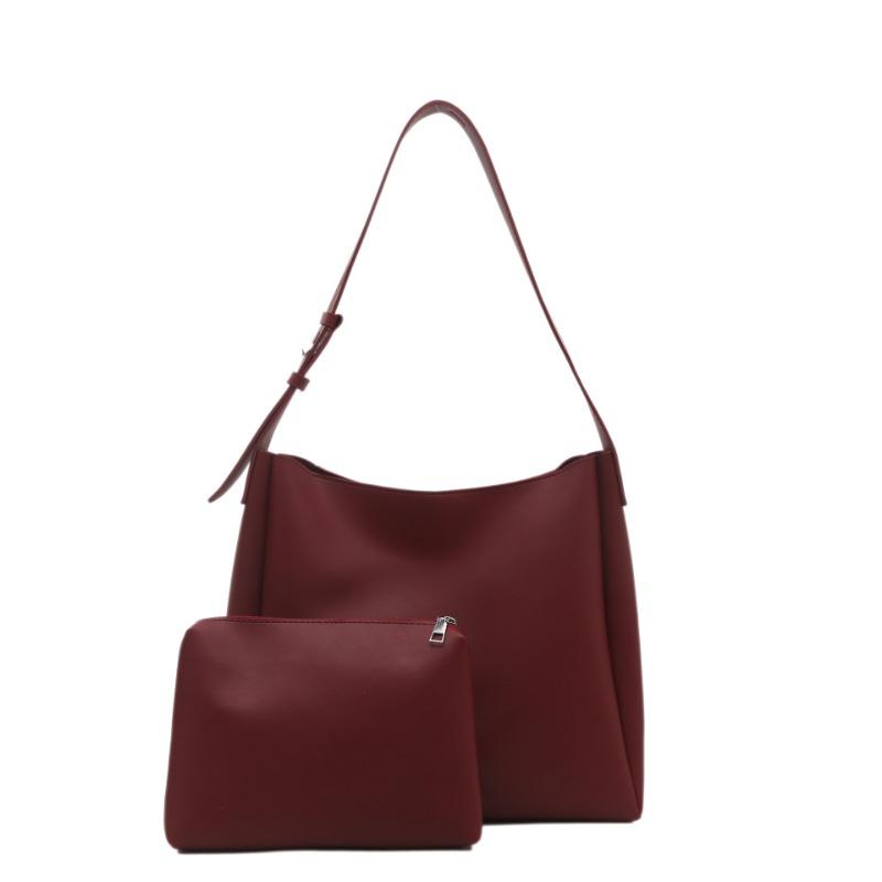 Large-capacity commuter bag women's spring new child and mother bag retro fashion soft leather shoulder bag portable tote bag