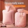 Thickened, explosion-proof hot water bottle for girls with imitation rabbit fur; perfect as a hand warmer, stomach compress, or foot warmer.