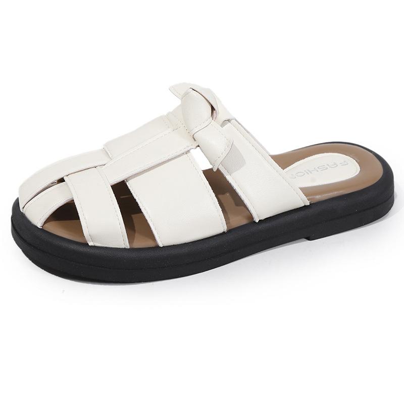 2025 summer new bag head half slippers female retro woven cool slippers female retro fairy wind soft flat Roman shoes