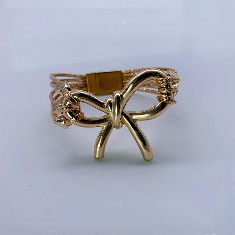 Modna europejska i amerykańska skórzana bransoletka z magnetycznym zapięciem w kształcie kokardy - Modna biżuteria damska na Boże Narodzenie