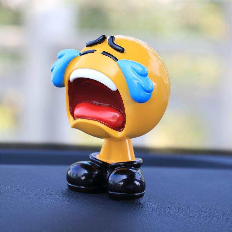 Ha Hu Emoji Bobblehead Car Ornament: Cute Cartoon Interior Decoration.