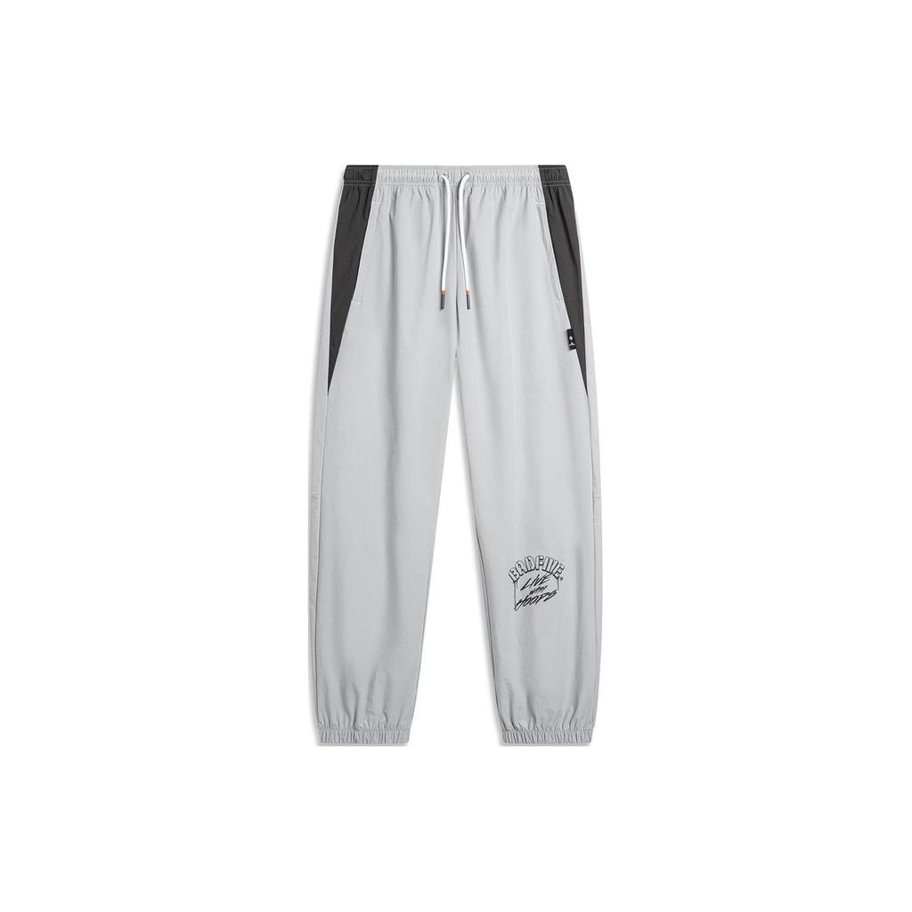 Li Ning Basketball Series Spliced Letter Mid-Rise Tapered Knit Sports Pants Men bottoms Mist-Gray AYKU389-1