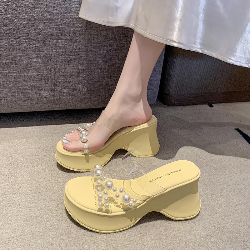 Summer new one-word strap transparent sexy high-heeled slippers women's waterproof table pearl slope heel cool slippers fashion