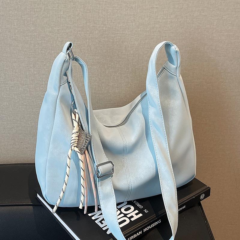 Niche cream soft waxy tote bag casual versatile student commuting large-capacity messenger bag woman