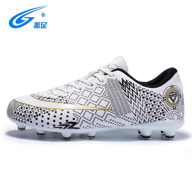 

Football shoes boys and girls long nails low-top mandarin ducks black and white football training shoes students sports shoes spikes sneakers 34 белый