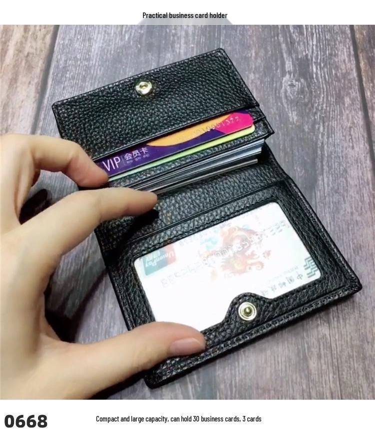 Premium Leather Card Holder: Unisex Cowhide Business Case with Mirror Window, Snap Closure & Coin Purse.
