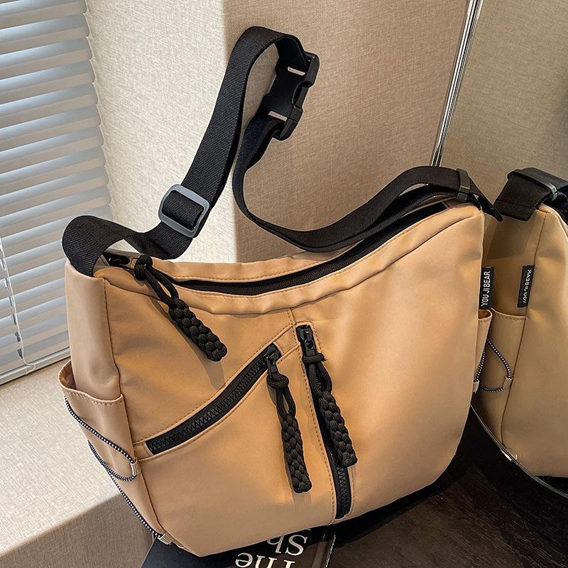 

Большая вместительная сумка женская 2024 новая высококачественная текстура нишевая летняя универсальная холщовая сумка-мессенджер на одно плечо сумка-пельмень хаки