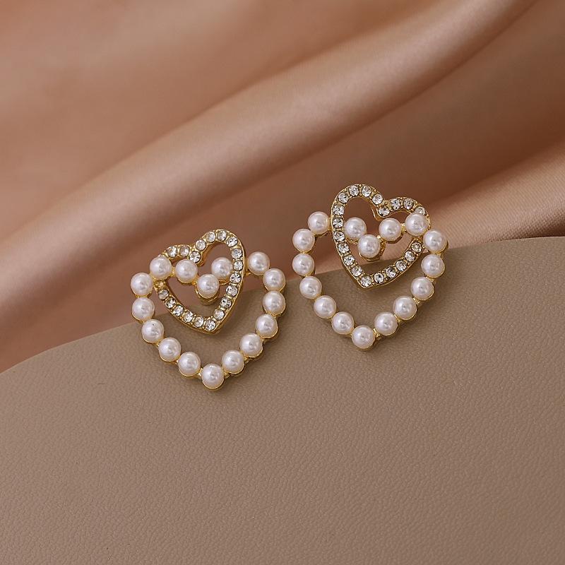 Temperament simple pearl love stud earrings women's light luxury niche design sense high sense Korean versatile earrings ear jewelry