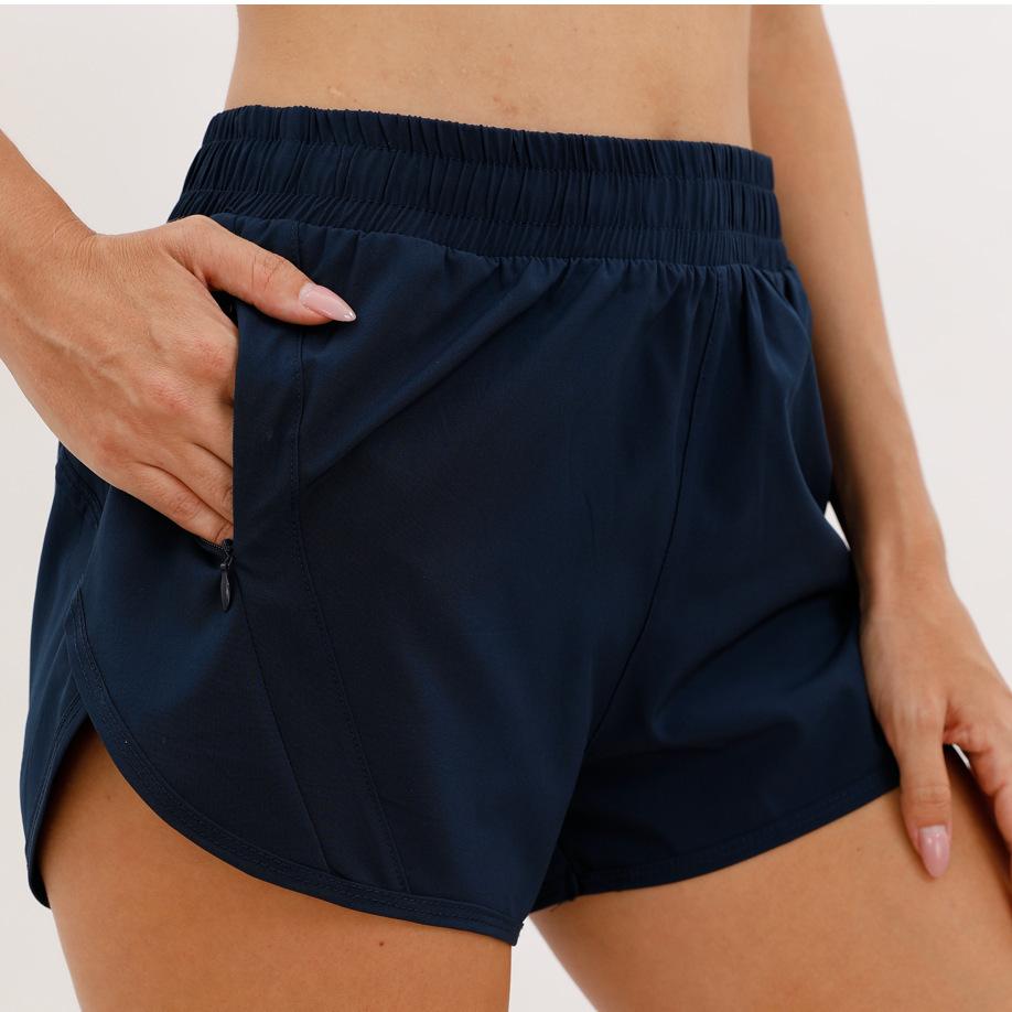 Neue atmungsaktive lockere Anti-Licht Yoga-Shorts Outdoor Freizeit Laufen Sportshorts Damen Fitness Hotpants