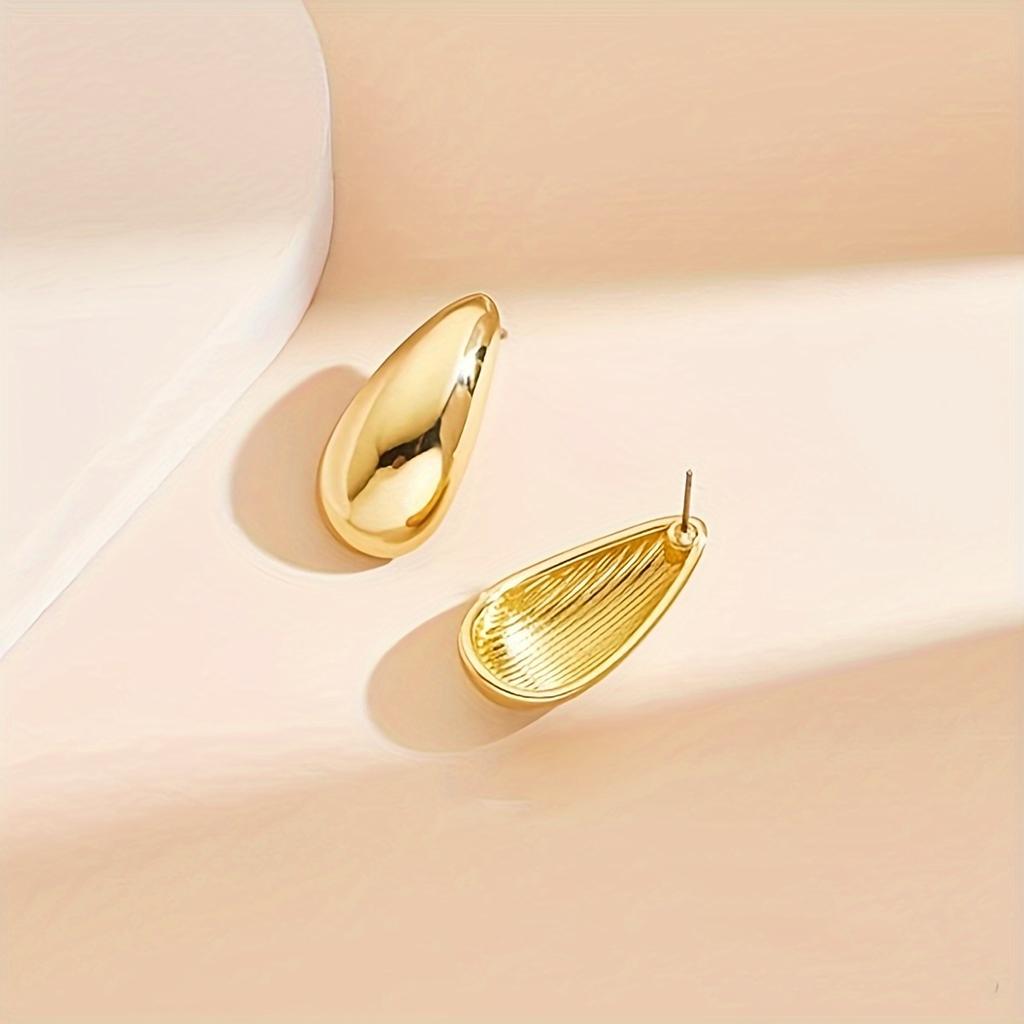 Unique Golden Color Waterdrop Shaped Earrings Personalized Stud Earrings Fashionable Ear Jewelry for Women Girls Suitable for All Seasons