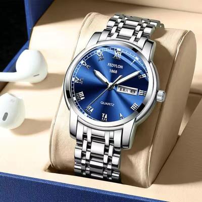 Nouvelle Montre Tendance Étudiant Style Coréen Noir avec Bracelet en Acier Romain pour Hommes Montre à Quartz Double Calendrier Étanche pour Hommes