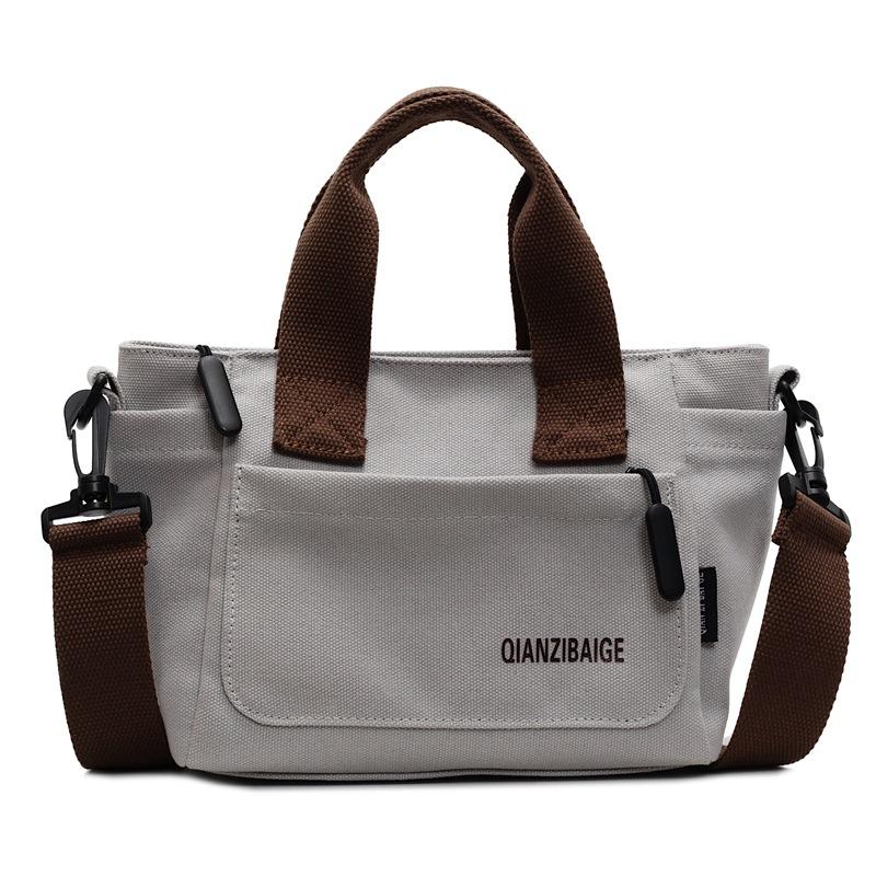 Stylish solid color simple commuter shoulder bag spring new niche casual lightweight messenger bag