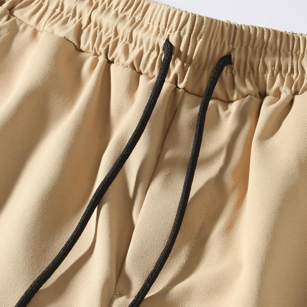 Nové pracovní oděvy kalhoty s mnoha kapsami pánské tkané kalhoty pro volný čas kalhoty se stahovací šňůrkou módní pánské kalhoty