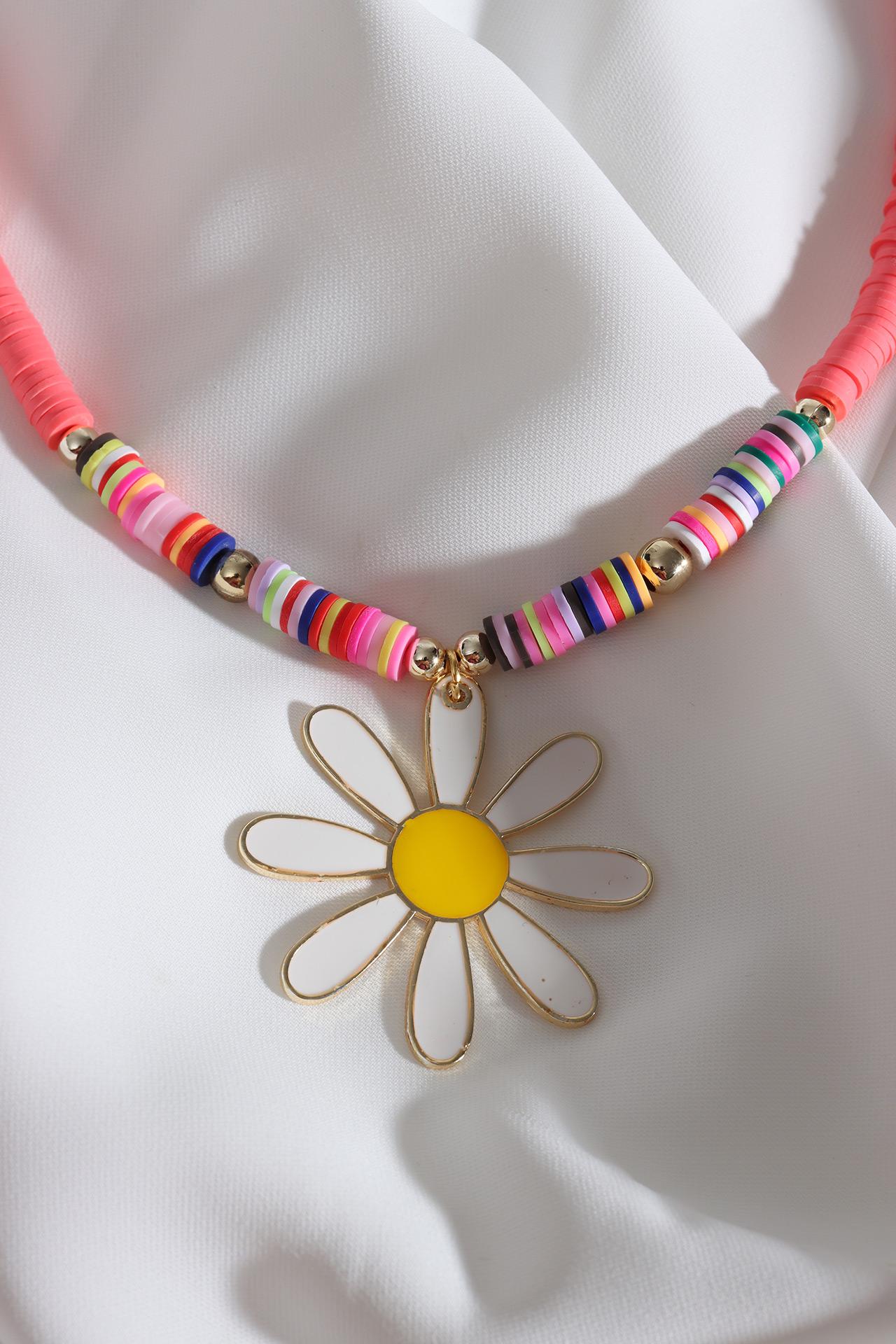 

Розовое колье Fimo с бисером и белой эмалью в виде ромашки