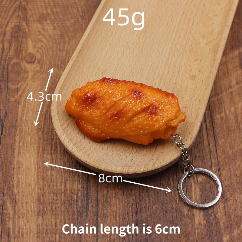 Lustiger gebratener Hühnerbein-Hühnerflügel-Schlüsselanhänger, kreativer Mini-Simulations-Lebensmittel-Anhänger mit Schlüsselring für Handtaschen-Geldbeutel-Zubehör