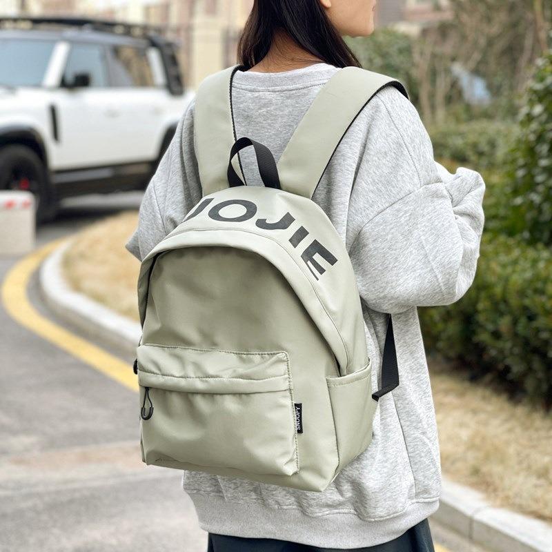 Trendy brand niche design backpack for men and women, lightweight weight weight reduction schoolbag, female college student travel small iPad backpack