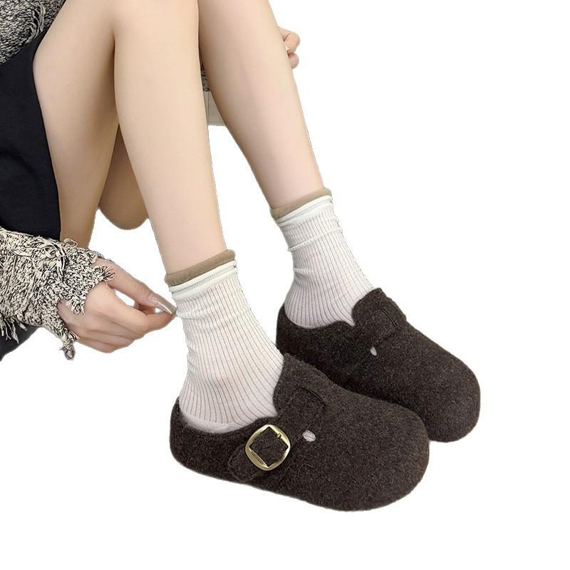 The woolen bag head woman wears a new thick bottom to increase the height, and the lazy person pedals half slippers with one foot.