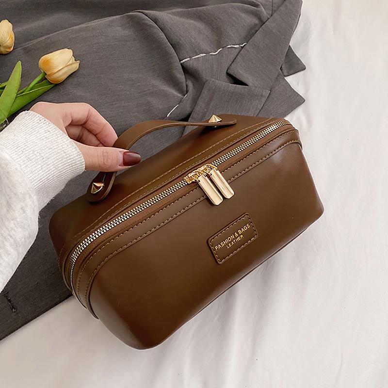 

Модна переносна косметичка з контрастним кольором Нова популярна жіноча сумка для зберігання зі шкіряною текстурою Ніша Високоякісна універсальна сумочка